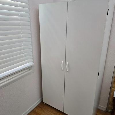 White two-door closet cabinet - storage cabinet with adjustable shelves