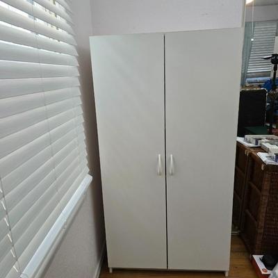 White two-door closet cabinet - storage cabinet with adjustable shelves