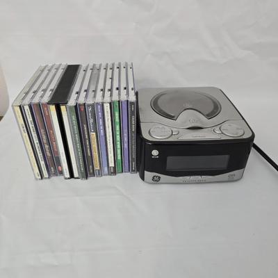 General Electric Model 7-4801A Alarm clock with CD player comes with assortment of Cd's!