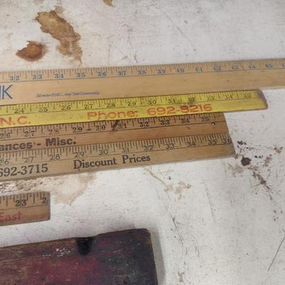 Assortment of Vintage Wood Framed Levels and Advertising Yard Sticks