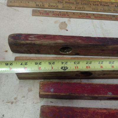 Assortment of Vintage Wood Framed Levels and Advertising Yard Sticks