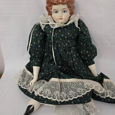 Antique Ceramic head, leg and armed China doll marked COX with a Ceramic headed Avon Heritage Heirloom pin doll