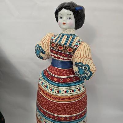 Antique Ceramic head, leg and armed China doll marked COX with a Ceramic headed Avon Heritage Heirloom pin doll