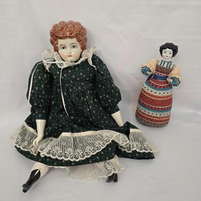 Antique Ceramic head, leg and armed China doll marked COX with a Ceramic headed Avon Heritage Heirloom pin doll
