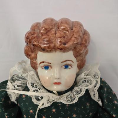 Antique Ceramic head, leg and armed China doll marked COX with a Ceramic headed Avon Heritage Heirloom pin doll