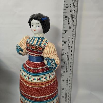 Antique Ceramic head, leg and armed China doll marked COX with a Ceramic headed Avon Heritage Heirloom pin doll