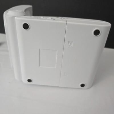 Working battery operated Personal fan - battery operated alarm clock and a large light up magnify glass