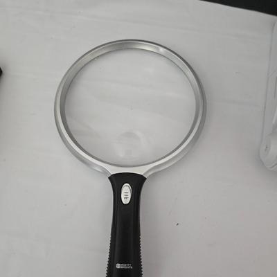 Working battery operated Personal fan - battery operated alarm clock and a large light up magnify glass