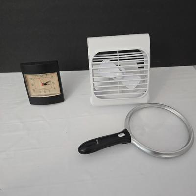 Working battery operated Personal fan - battery operated alarm clock and a large light up magnify glass