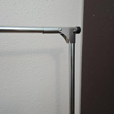 Fold away chrome clothes rack / closet organizer with matching shoe rack and an over the door hanger.