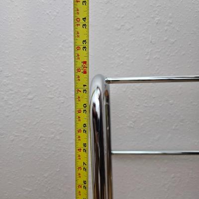 Fold away chrome clothes rack / closet organizer with matching shoe rack and an over the door hanger.