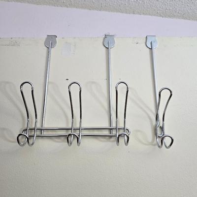 Fold away chrome clothes rack / closet organizer with matching shoe rack and an over the door hanger.