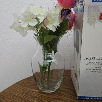 25" Oak claw foot side table with brand new table lamp and a vase with faux flowers