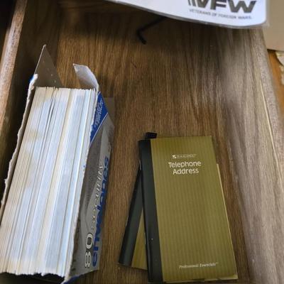 Collection of office supplies - telephone - paper - calculator - writing utensils - notebooks and more !