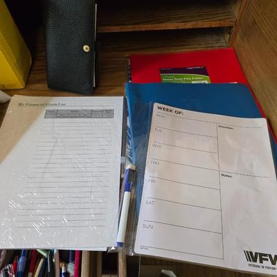 Collection of office supplies - telephone - paper - calculator - writing utensils - notebooks and more !