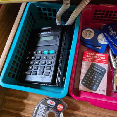 Collection of office supplies - telephone - paper - calculator - writing utensils - notebooks and more !