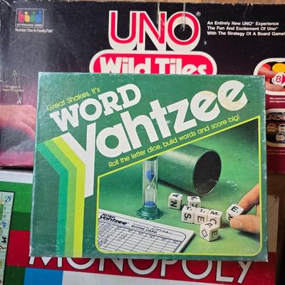 Assortment of fun board games - Racko - Word Yahtzee - Uno wild tiles - upwords and more