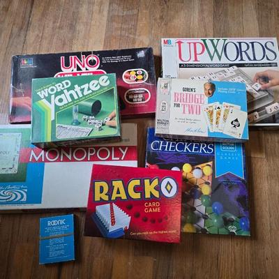 Assortment of fun board games - Racko - Word Yahtzee - Uno wild tiles - upwords and more