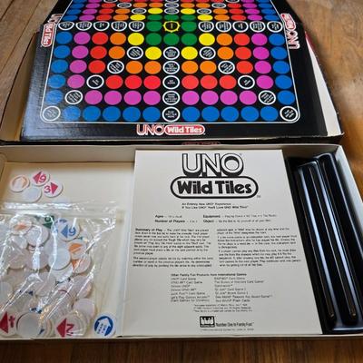 Assortment of fun board games - Racko - Word Yahtzee - Uno wild tiles - upwords and more