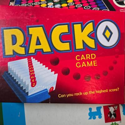 Assortment of fun board games - Racko - Word Yahtzee - Uno wild tiles - upwords and more