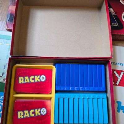 Assortment of fun board games - Racko - Word Yahtzee - Uno wild tiles - upwords and more