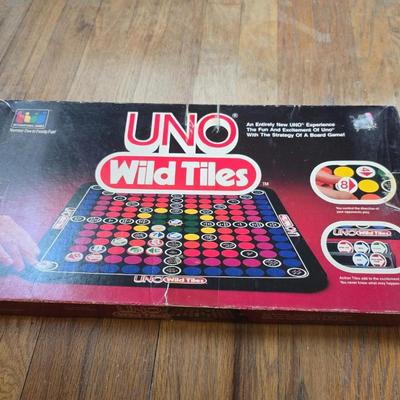 Assortment of fun board games - Racko - Word Yahtzee - Uno wild tiles - upwords and more