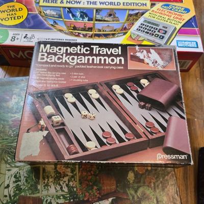 Variety of board games and a few puzzles - Monopoly world edition- Scrabble - Backgammon and more