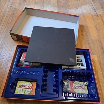 Variety of board games and a few puzzles - Monopoly world edition- Scrabble - Backgammon and more
