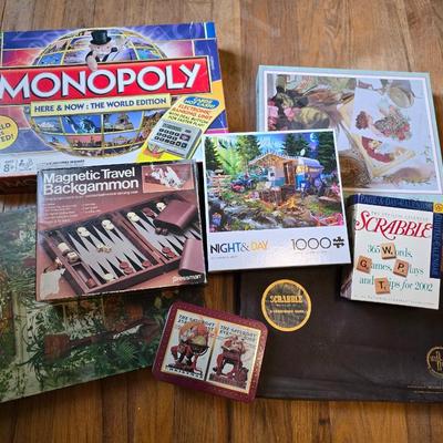 Variety of board games and a few puzzles - Monopoly world edition- Scrabble - Backgammon and more