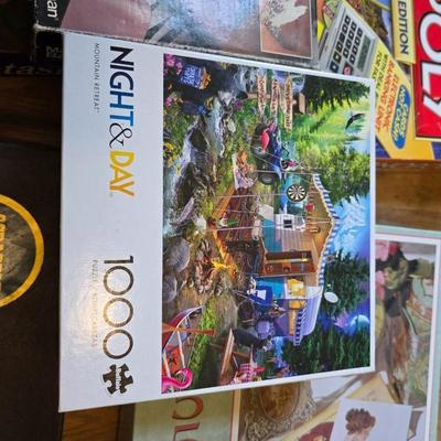 Variety of board games and a few puzzles - Monopoly world edition- Scrabble - Backgammon and more