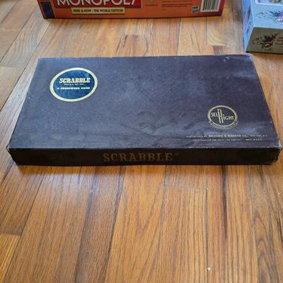Variety of board games and a few puzzles - Monopoly world edition- Scrabble - Backgammon and more