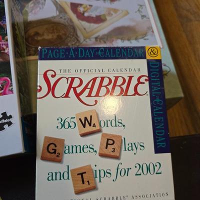Variety of board games and a few puzzles - Monopoly world edition- Scrabble - Backgammon and more