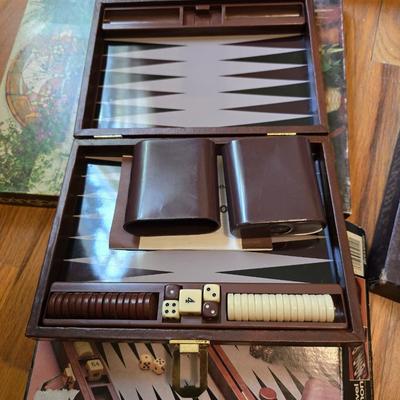 Variety of board games and a few puzzles - Monopoly world edition- Scrabble - Backgammon and more