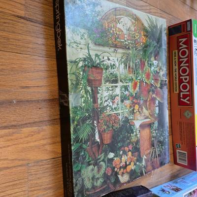 Variety of board games and a few puzzles - Monopoly world edition- Scrabble - Backgammon and more