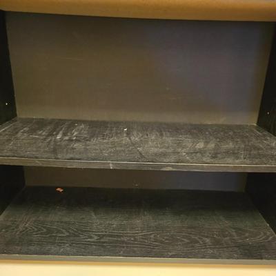 Small black bookshelf with adjustable shelving
