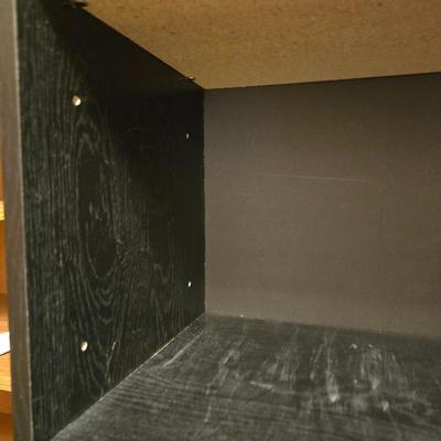 Small black bookshelf with adjustable shelving