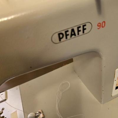 Pfaff 90 sewing machine in sewing machine cabinet with accessories - powers on and runs!