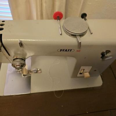 Pfaff 90 sewing machine in sewing machine cabinet with accessories - powers on and runs!