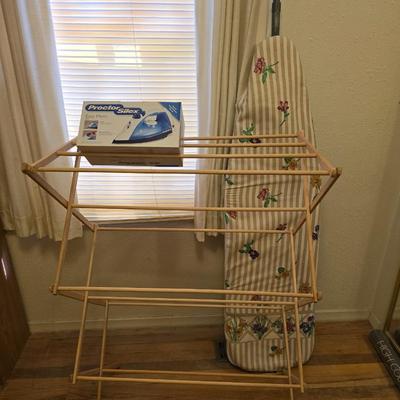 Two Laundry wooden drying racks with iron and ironing board