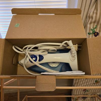 Two Laundry wooden drying racks with iron and ironing board