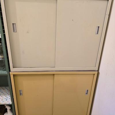 Two vintage metal base cabinet storage with sliding doors