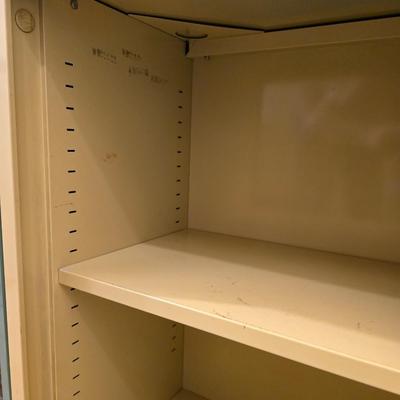 Two vintage metal base cabinet storage with sliding doors