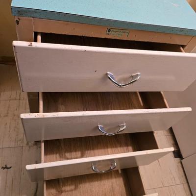 Vintage Four drawer metal kitchen cabinet with Formica top