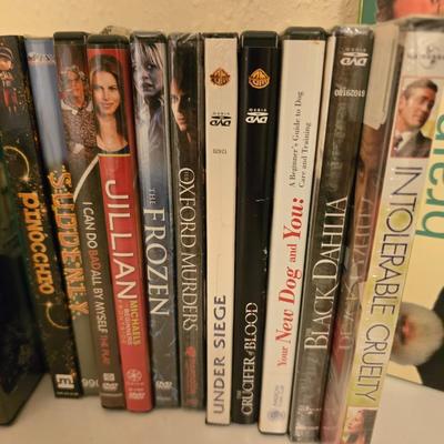 Sanyo DVD Player Model FWDP105F with remote and a collection of movies on DVD