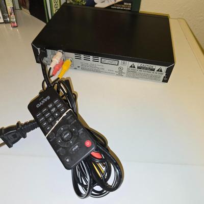 Sanyo DVD Player Model FWDP105F with remote and a collection of movies on DVD