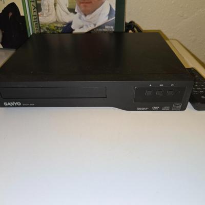 Sanyo DVD Player Model FWDP105F with remote and a collection of movies on DVD