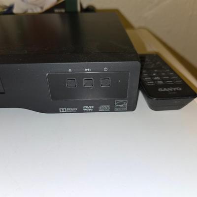 Sanyo DVD Player Model FWDP105F with remote and a collection of movies on DVD