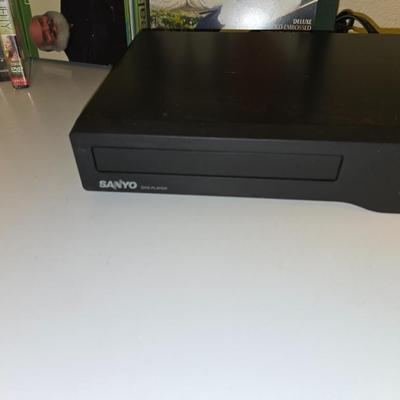 Sanyo DVD Player Model FWDP105F with remote and a collection of movies on DVD