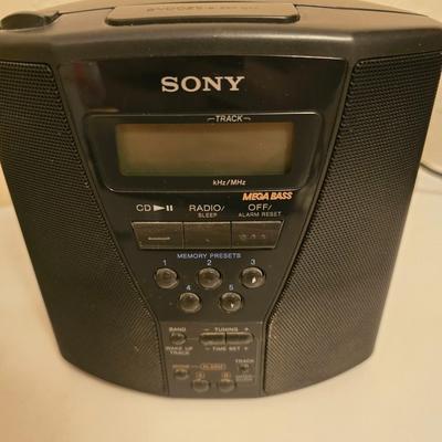Sony mega bass personal cd player / radio / alarm clock with a variety of music on CD
