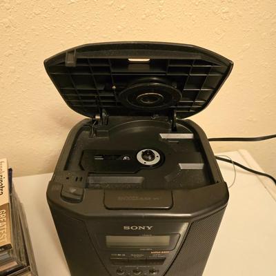Sony mega bass personal cd player / radio / alarm clock with a variety of music on CD